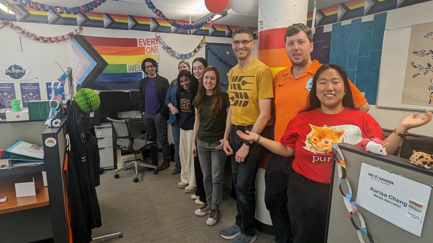 Staff standing for a photograph